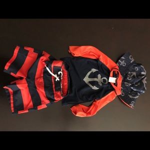 Matching swim shirt, trunks and hat